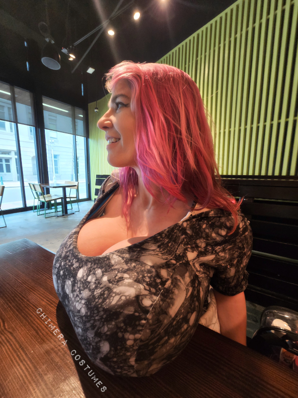 Busty woman in activewear navigating exercise challenges with a large chest