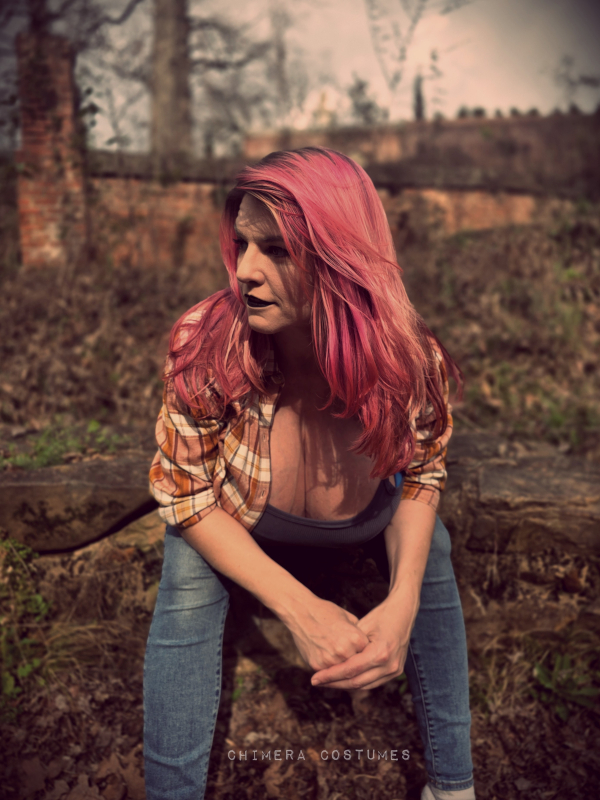 Curvy busty woman representing breast health awareness and medical self-care