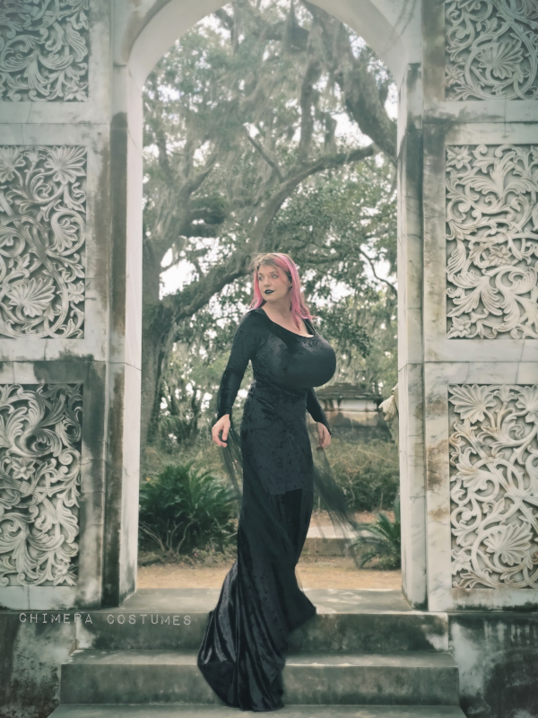 Curvy woman reflecting on mental health and body image challenges of having a large bust